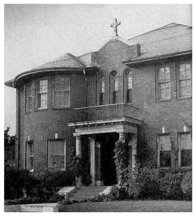 historic brick building in black and white